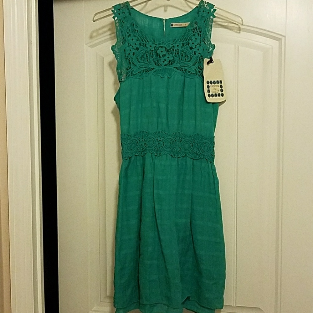 New w/ tags. Turquoise dress.